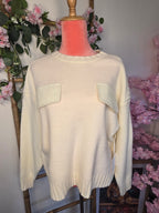 Pull maille poche simili.