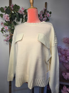 Pull maille poche simili.