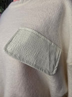 Pull maille poche simili.