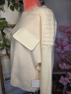 Pull maille poche simili.